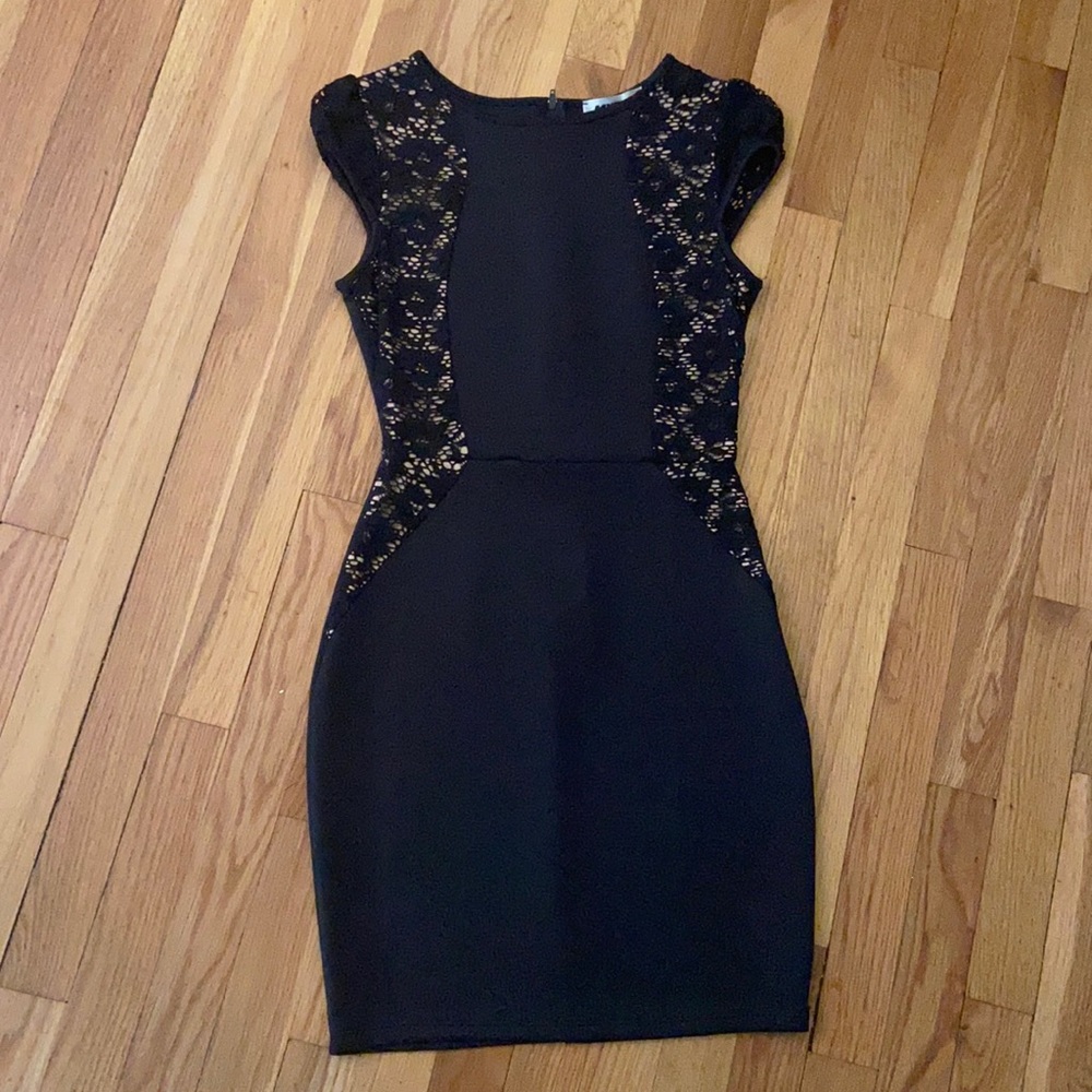 Black cocktail dress with lace sides